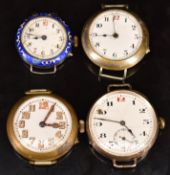 Four trench style wristwatches including two silver examples one with blue enamel bezel, largest