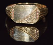 A 9ct gold signet ring with ridged shoulders and engraved decoration, 4.1g, size S