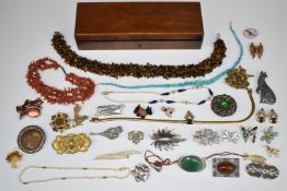 A collection of jewellery, necklaces including pearl, turquoise, coral, and tiger's eye, brooches