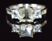 A 9ct white gold ring set with zircon and aquamarines, 2.2g, size M