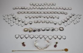 A collection of costume rings set with sapphire, rubies and opals, etc