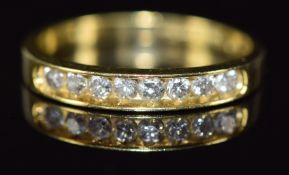 An 18ct gold half eternity ring set with eight diamonds totalling approximately 0.33ct, 2.6g, size