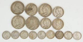 A collection of Victorian silver coins to include four crowns, three half crowns and shillings, in