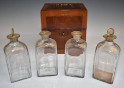 Georgian four-bottle travelling drinks case / tantalus with fitted interior and brass handle, the