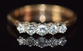 An 18ct gold ring set with a diamond in an platinum illusion setting, 2.1g, size K
