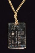 A 9ct gold calendar pendant set with a diamond over April 9th on yellow metal chain, pendant 2.4cm