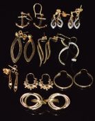 Ten pairs of 9ct gold earrings including diamond set, 13.7g
