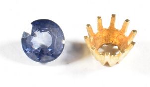 A loose round cut cornflower blue sapphire of approximately 2.5ct together with a section of gold