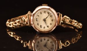 Unnamed 9ct gold ladies wristwatch with blued hands, gold Arabic numerals and engraved silver