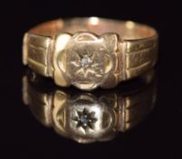 A 9ct gold ring set with a diamond in a star setting, 2.7g, size R