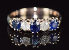A 9ct gold ring set with sapphires and diamonds, 2.9g, size O