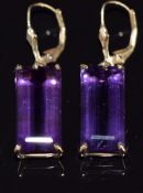 A pair of 9k gold earrings set with an amethyst to each, 7.5g, 3.5cm