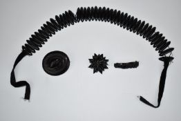 Victorian jet necklace made up of elongated beads and three Victorian carved jet brooches