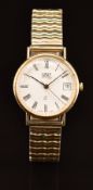 Uno 9ct gold gentleman's wristwatch with date aperture, black hands and Roman numerals, white dial