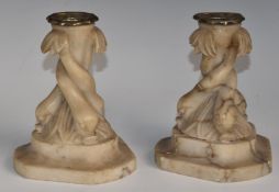 A pair of 19thC Grand Tour carved alabaster figural fish / dolphin candlesticks, height 16cm