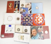A collection of Royal Mint and other coin souvenir collection packs, Royal family related