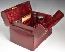 J.W. Benson red leather travelling vanity set, in Gladstone style bag, including four hallmarked