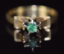 A 14ct gold ring set with an emerald, 2.5g, size P