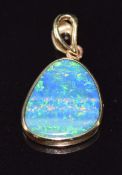 A 10k pendant set with a black opal, 1.6 x 1cm, 1.3g