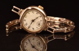 Unnamed 9ct gold ladies wristwatch with Breguet hands, Arabic numerals and silver dial, on 9ct