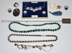 A silver rope twist necklace, silver ingot, Sphinx necklace and earrings, malachite beaded necklace,