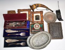 A horn trumpet, boxed Model B Simplex typewriter, Persian metal plaques, two daguerreotypes in