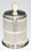 Art Deco hallmarked silver desk top novelty cigarette dispenser with engine turned decoration,