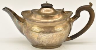 George V hallmarked silver teapot in the Georgian style, Birmingham 1923, maker's mark rubbed,