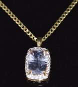 A 9ct gold pendant set with morganite and topaz on 9ct gold chain, pendant 2.4cm and chain 44cm, 5.