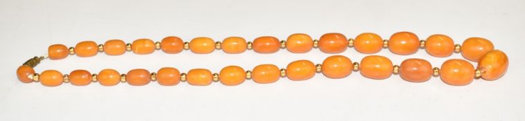 Baltic amber beaded necklace, 24g, the largest bead approximately 2cm