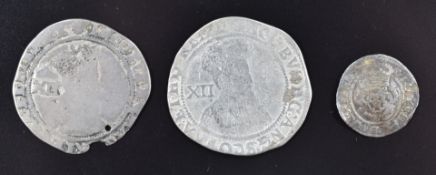 Three James I hammered silver coins comprising a shilling, a twopence (2nd coinage) and a thistle