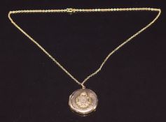 A 9ct gold locket with Bedfordshire Regiment emblem on 9ct gold chain, 8.2g