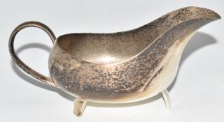 Elizabeth II Elkington hallmarked silver modernist design sauce boat, Birmingham 1961, length