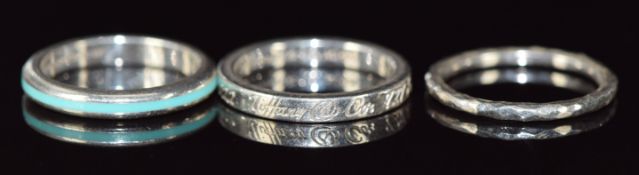 Three Tiffany & Co silver rings, one set with aqua enamel, one of faceted design by Paloma Picasso