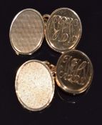 A pair of 9ct gold cufflinks with engine turned decoration, in Martin & Co box, 14.7g