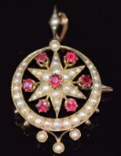 Edwardian 9ct gold pendant/brooch set with seed pearls and rubies in the form of a star and
