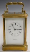 Blaquart of Boulogne brass cased repeater carriage clock with white enamel dial, the movement marked