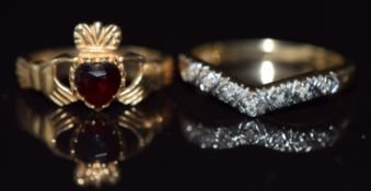 A 9ct gold Claddagh ring set with a heart cut garnet and a 9ct gold ring set with diamonds, 3.8g,