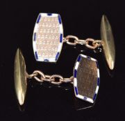 A pair of 9ct gold cufflinks with engine turned decoration and set with blue and white enamel to