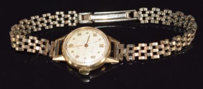 A 9ct gold watch, 16.1g in Movado watch box