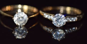 Two 9ct gold rings set with cubic zirconia, 3.9g, sizes O & L