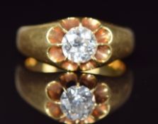 An 18ct gold ring set with a round cut diamond of approximately 0.8ct, 9g, size O