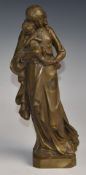Brass sculpture of a mother and child, height 32cm