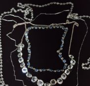 Two Art Deco platinon necklaces, an Art Deco platinin necklace and one other