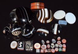 Three banded agate beads, banded agate cabochons, other sections of agate and a quantity of
