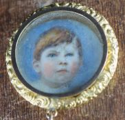 Victorian gold locket set with a portrait miniature of a young David Wormald 1907-1927 (3cm),