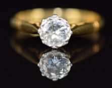 An 18ct gold ring set with a diamond of approximately 0.5ct in a platinum illusion setting, 2.2g,