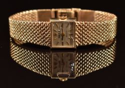 Rolex Precision 9ct gold ladies wristwatch with black hands, gold hour markers, silver dial and