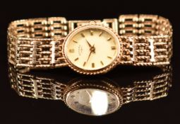 Rotary 9ct gold ladies wristwatch with gold hands and hour markers, cream dial and quartz