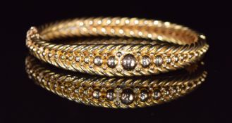 Victorian 15ct gold bangle with rope twist and sphere decoration, 21.6g, 5.8 x 5cm
